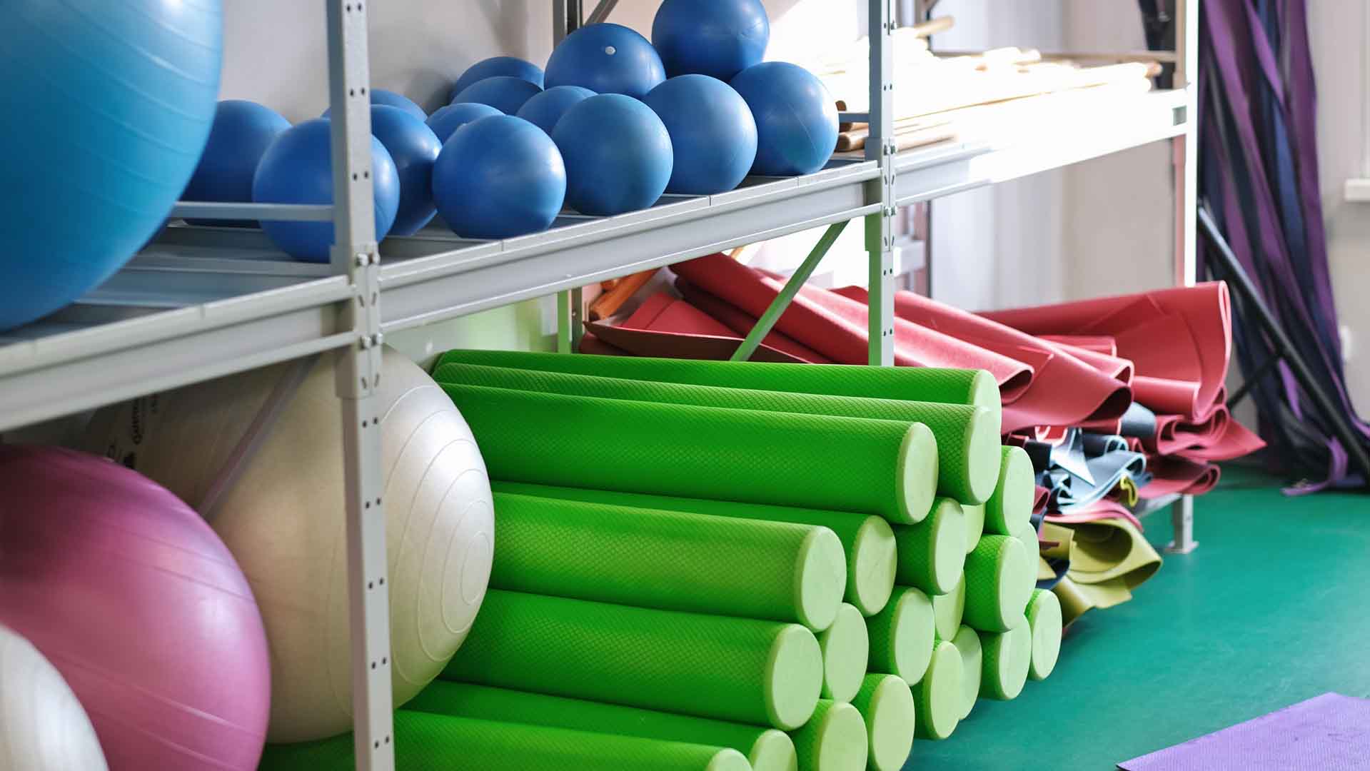 Sensory equipment including therapy balls, foam rollers, and mats used for occupational therapy sessions at OrbRom Center Phnom Penh