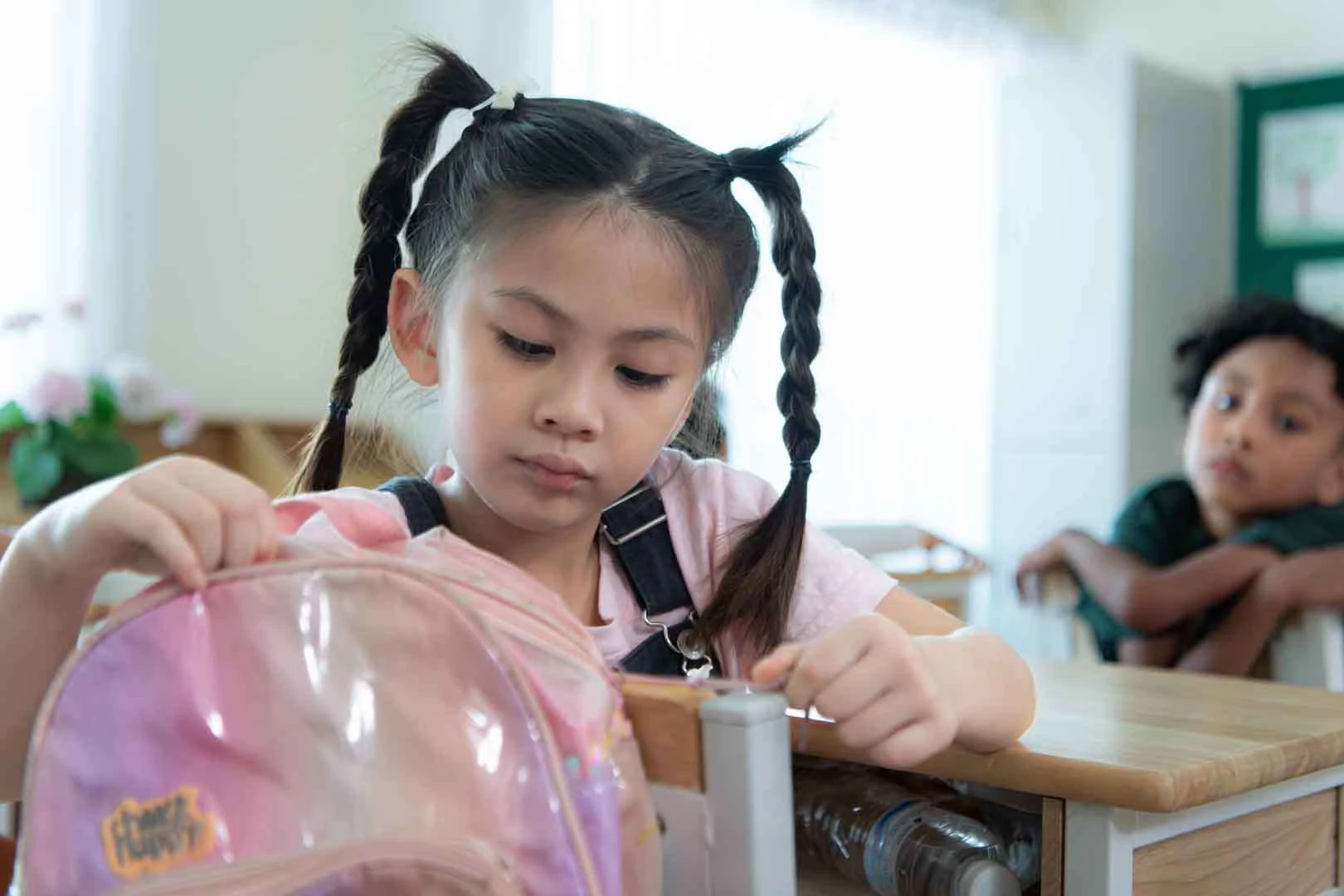 Asian child receiving therapy support in a sensory-friendly setting