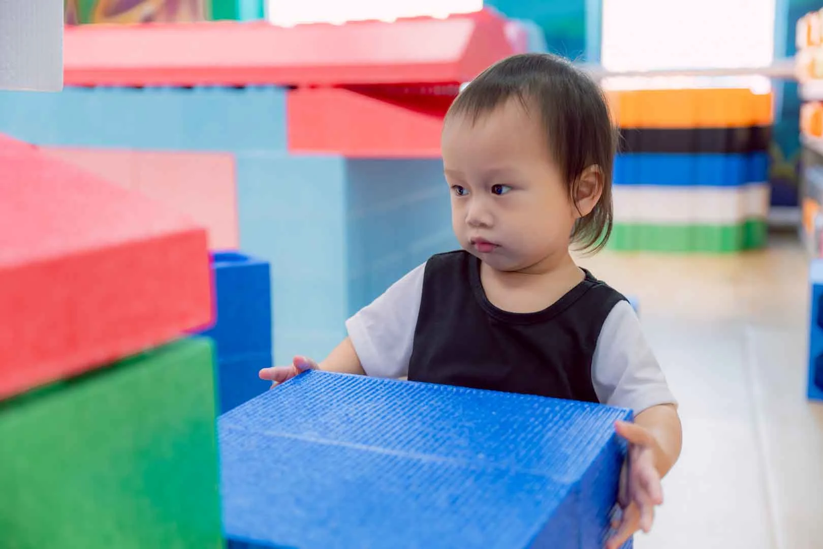 Child psychologist at OrbRom Center evaluating developmental milestones of a young student in Phnom Penh.
