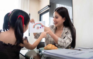 Child participating in a speech therapy session at OrbRom Center in Phnom Penh, engaging in communication-building activities.