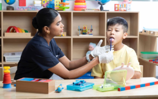 Speech therapist supporting communication and language recovery for aphasia