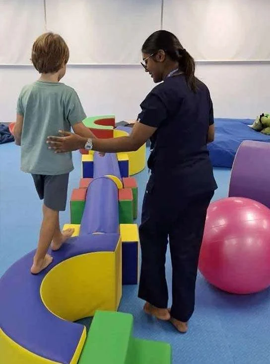 Child receiving professional therapy support at OrbRom Center in Cambodia