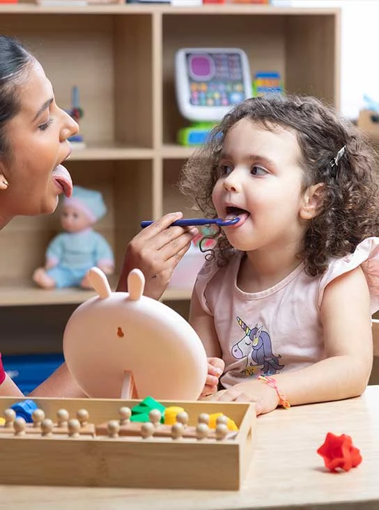 Speech therapist supporting communication and language recovery for aphasia
