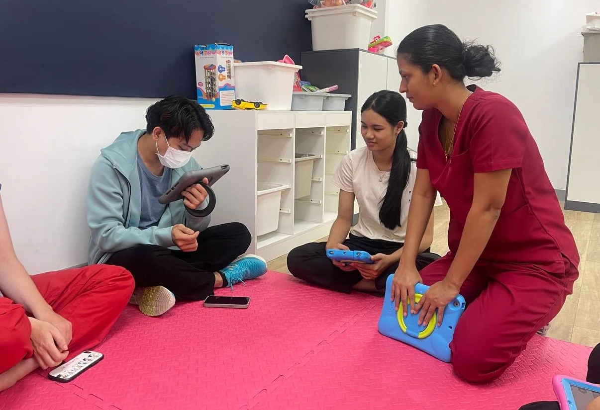 AAC training session with a speech language pathologist supporting functional communication skills