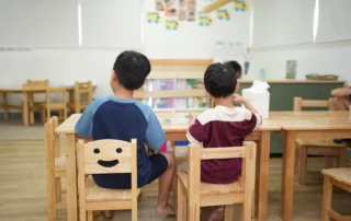 Children participating in structured learning activities in a special education classroom at OrbRom Center in Phnom Penh