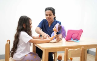 Child participating in a speech therapy activity to build communication and language skills