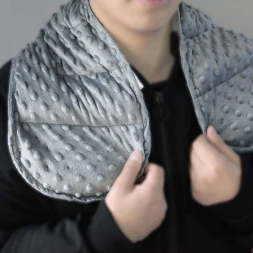 Sensory weighted neck wrap providing deep pressure input for relaxation